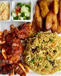 Chinese Fried Rice, salad, plantain, and Goatmeat